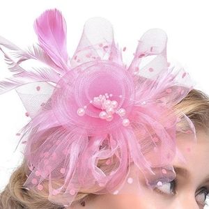 Pink head piece fasinator